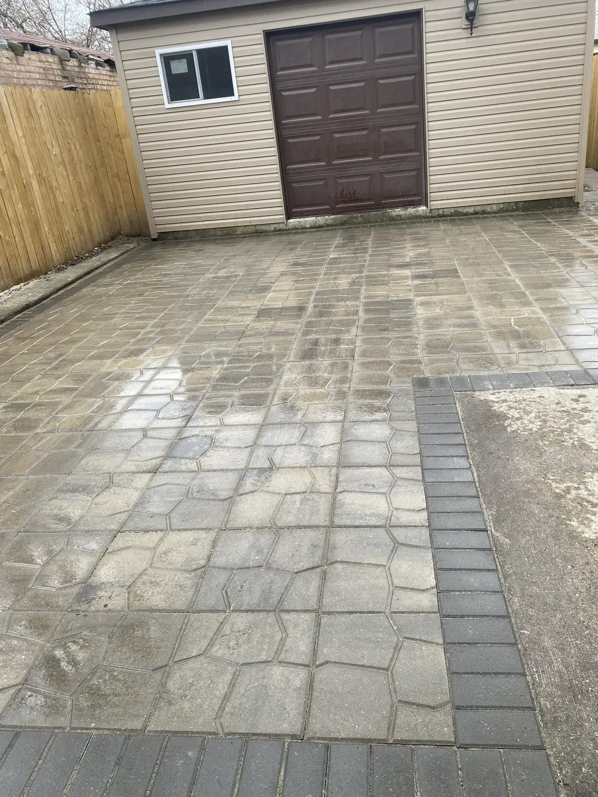 Stone patio near garage